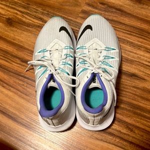 Purple/teal Nike quest